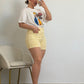 PANTALON CORTO AMARILLO