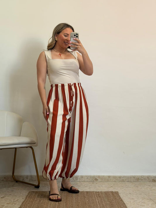 PANTALON GLOBO BEIGE Y CALDERA