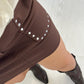 FALDA TACHUELAS MARRON